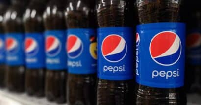 Close up of Pepsi bottles on display at a supermarket, representing the Pepsi lawsuit.