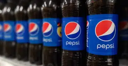 Close up of Pepsi bottles on display at a supermarket, representing the Pepsi lawsuit.