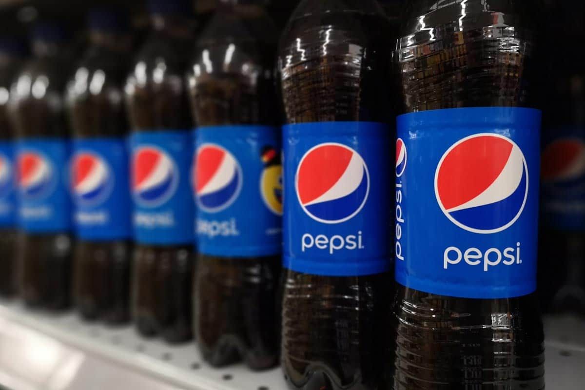 Close up of Pepsi bottles on display at a supermarket, representing the Pepsi lawsuit.