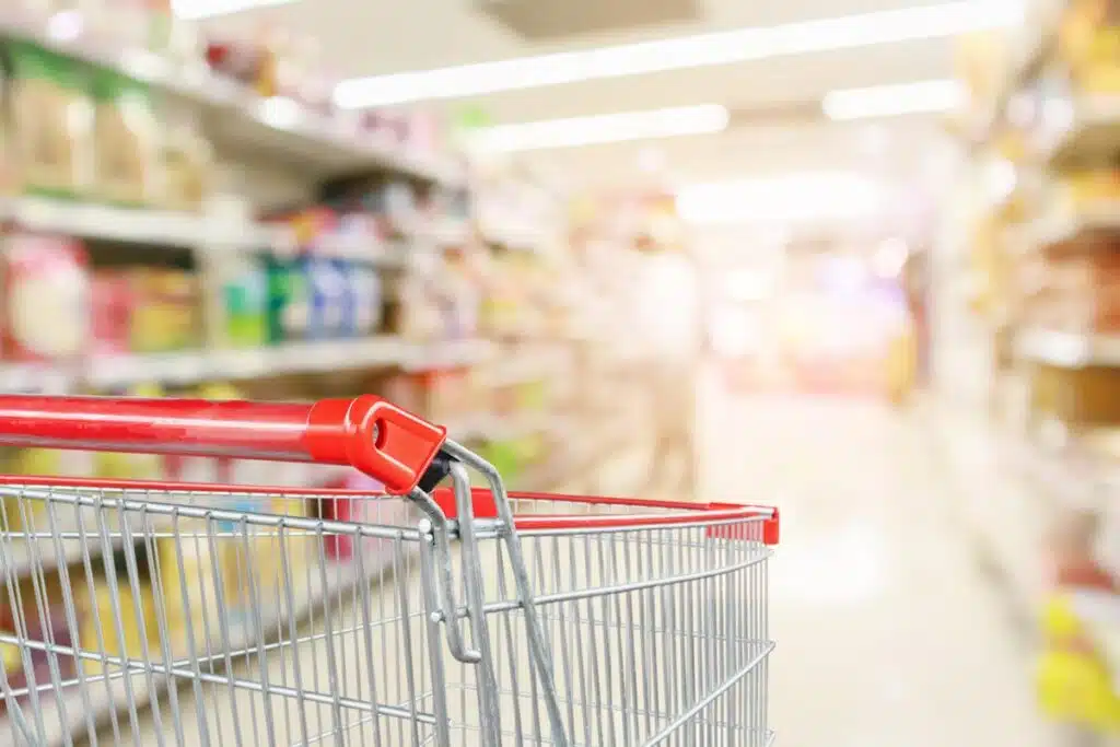 Close up of a shopping cart in a supermarket, representing top recalls for the week of Jan. 20.