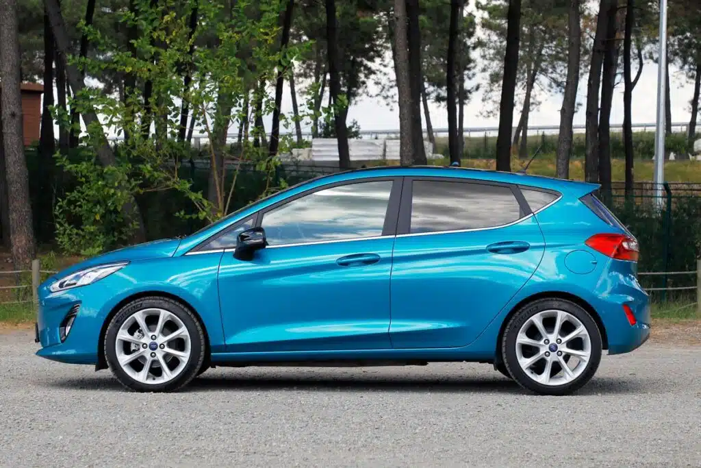 Side view of a blue Ford Fiesta, representing the Ford recall.