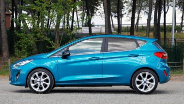 Side view of a blue Ford Fiesta, representing the Ford recall.