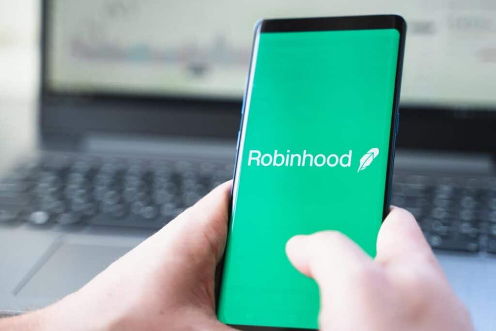 Robinhood logo displayed on a smartphone, representing the Robinhood fine.