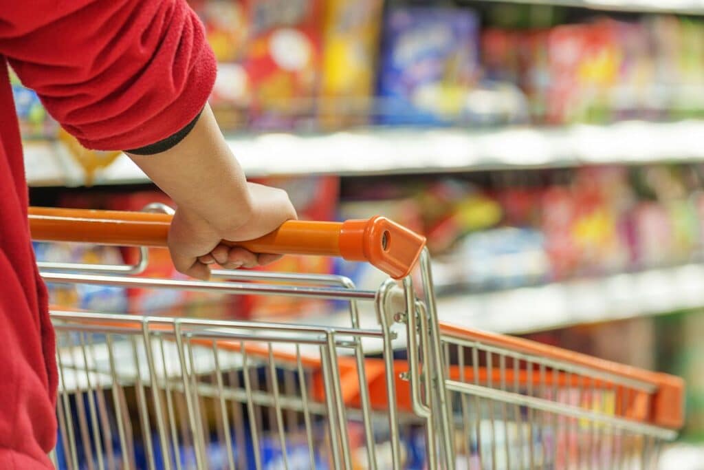 Close up of woman pushing a shopping trolley, representing top recalls for the week of Jan. 6.