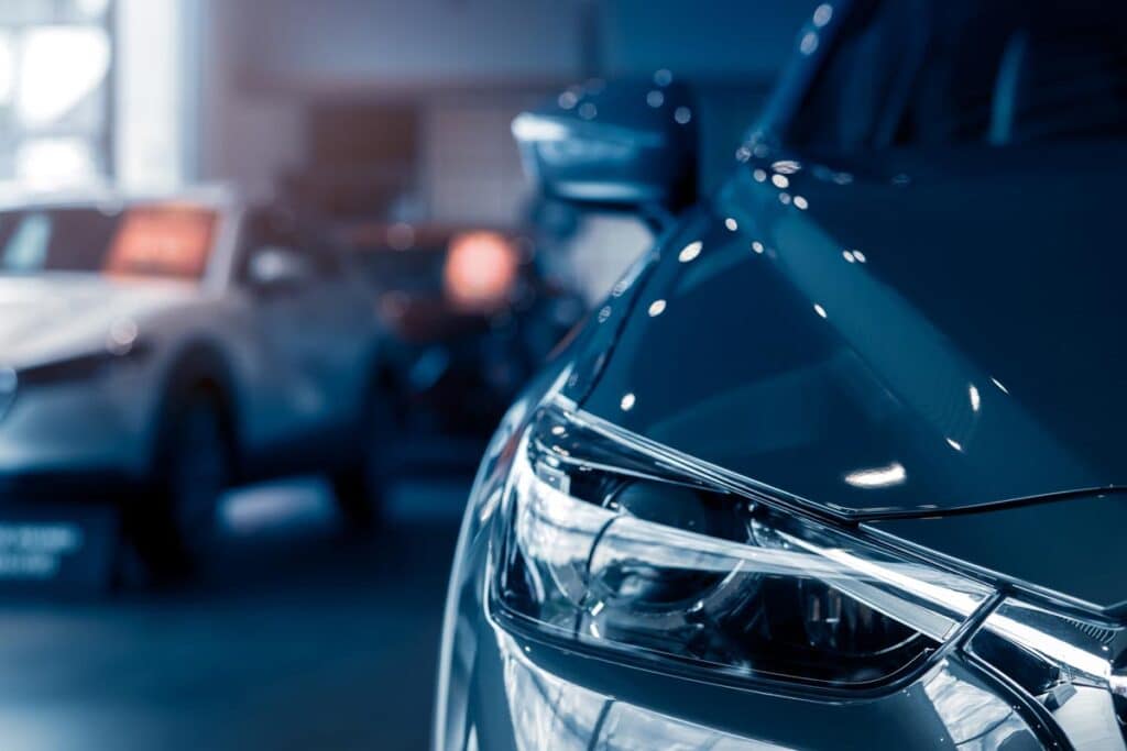 Close up of a headlight on a car, representing December auto recalls.