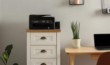 A printer on top of furniture, representing the household products recalls and lawsuits.