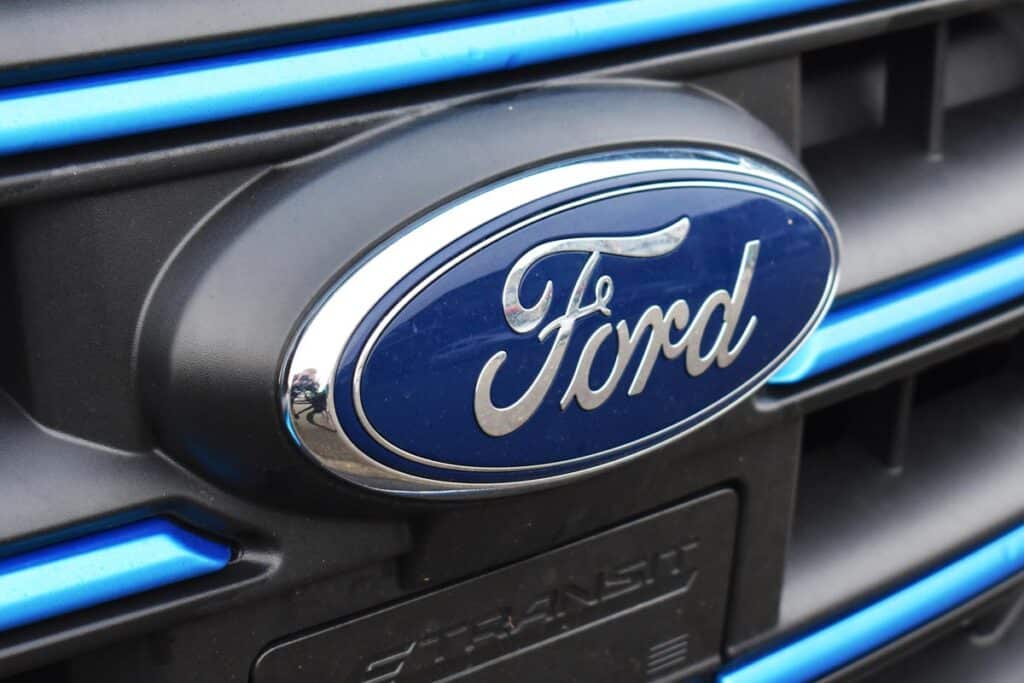 Close up of Ford emblem on a front bumper, representing the Ford recall.