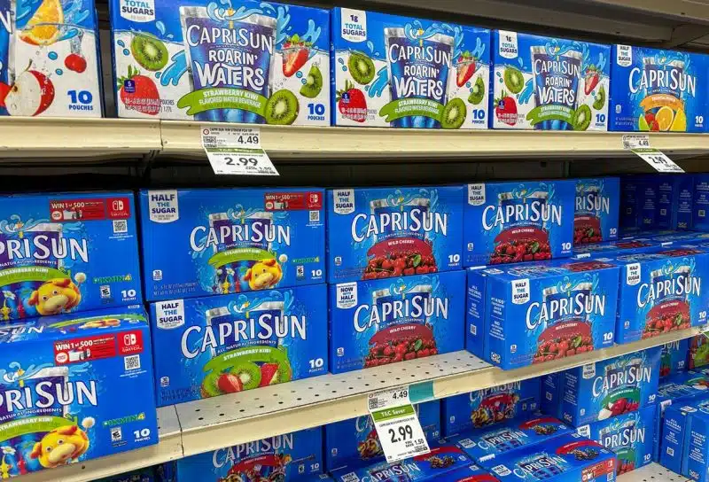 Capri-sun products on display at a supermarket, representing the Capri-Sun class action.