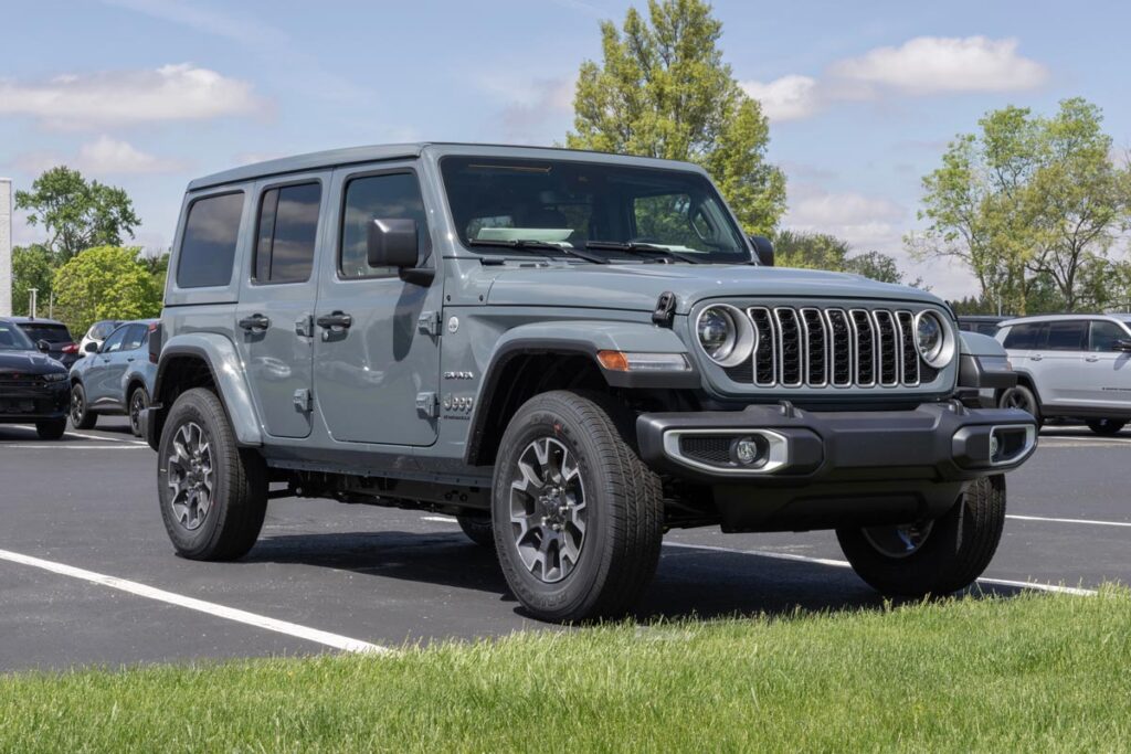 A gray Jeep Wrangler in a parking lot, representing the Jeep class action.