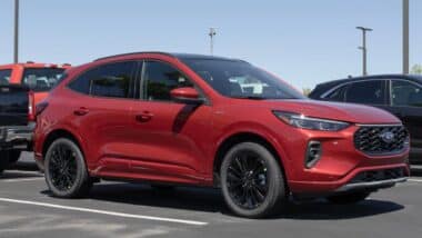 A red 2024 Ford Escape in a parking lot, representing the Ford Escape and Lincoln Corsair recall.