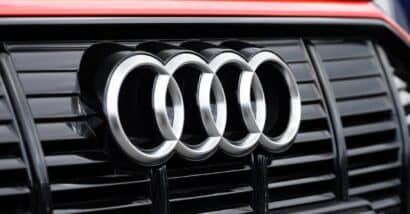 Close up of Audi emblem on a front bumper, representing the Audi class action.