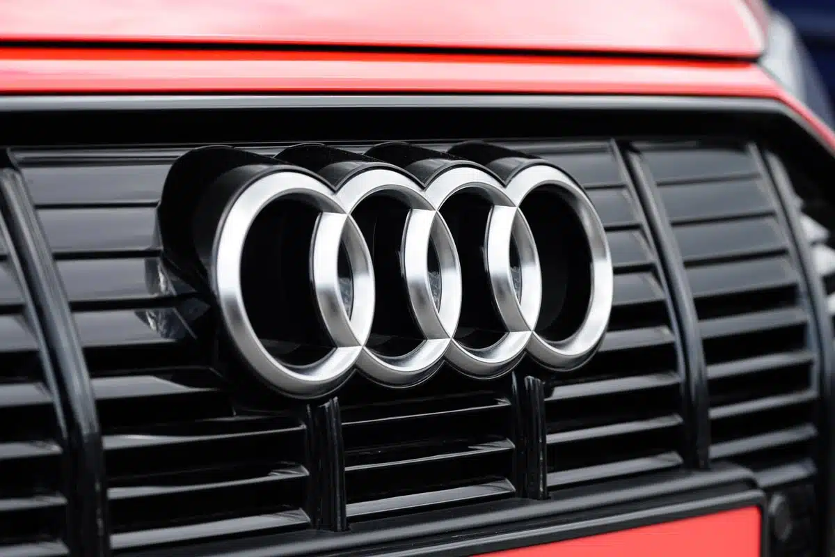 Close up of Audi emblem on a front bumper, representing the Audi class action.