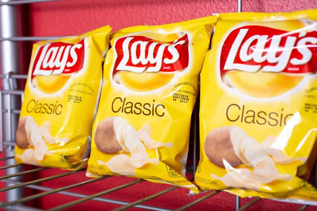 Lays chips on a shelf, representing the Lay's potato chip recall.