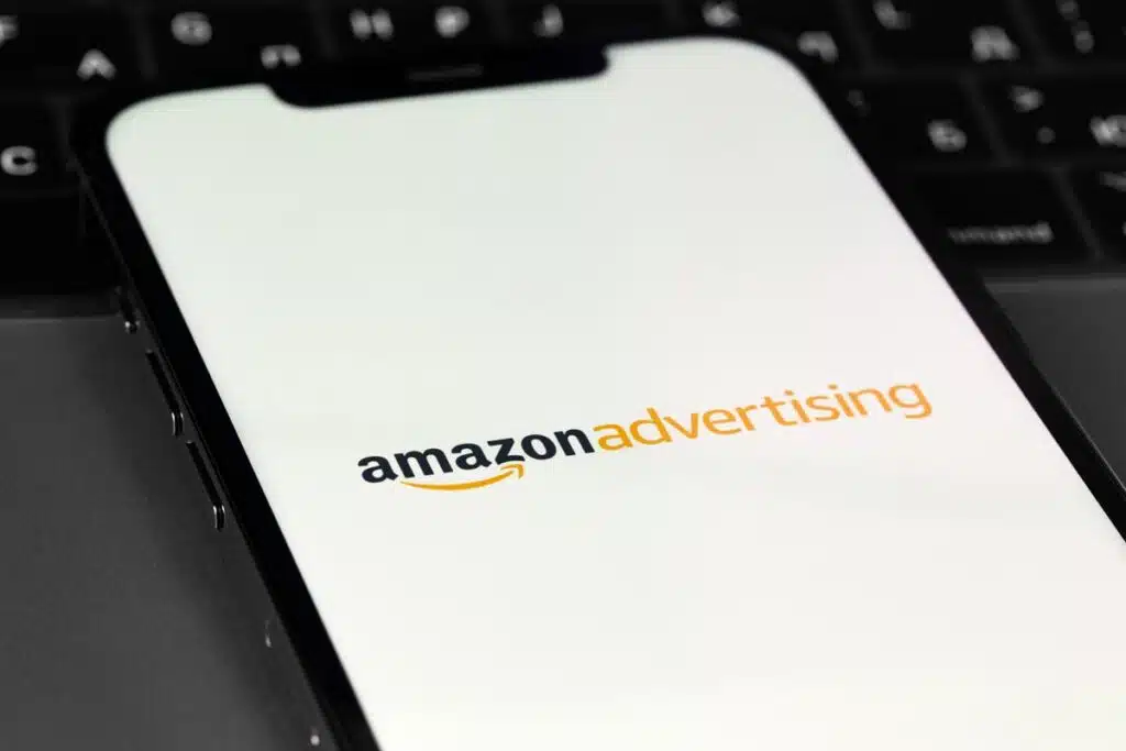Close up of Amazon Advertising logo displayed on a smartphone, representing the Amazon class action.