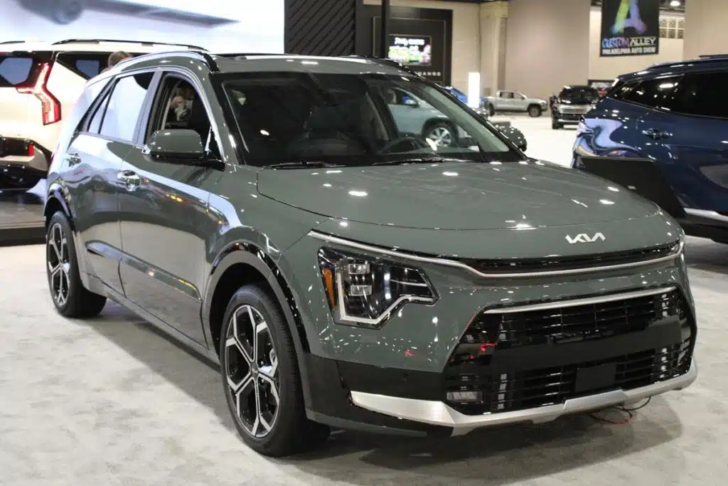 A Kia Niro at a car show, representing the Kia recall.