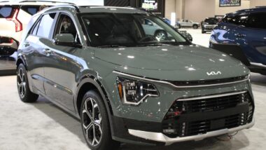 A Kia Niro at a car show, representing the Kia recall.