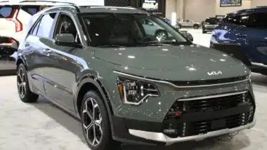 A Kia Niro at a car show, representing the Kia recall.