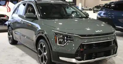 A Kia Niro at a car show, representing the Kia recall.