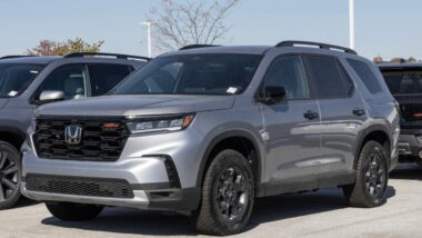 A gray 2025 Honda Pilot in a parking lot, representing the Honda and Acura recall.