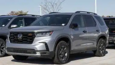A gray 2025 Honda Pilot in a parking lot, representing the Honda and Acura recall.