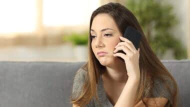 woman fielding another telemarketing call.