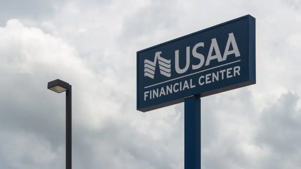 A USAA Financial Center sign sits high in the sky, attracting customers to their banking and insurance services.