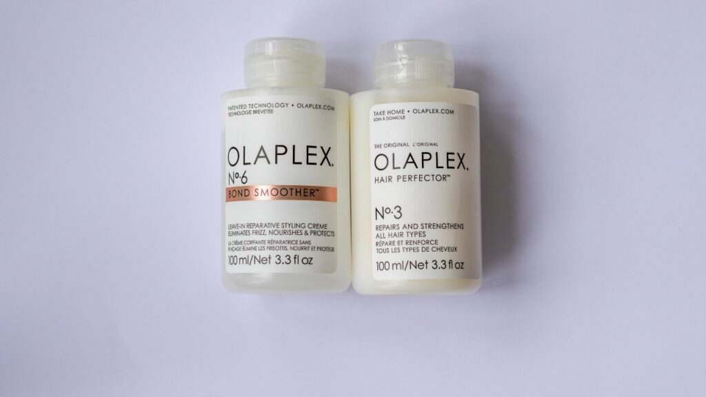 hair restoration and repair mask OLAPLEX 3 and 6 Bond Smoother, Illustrative Editorial.
