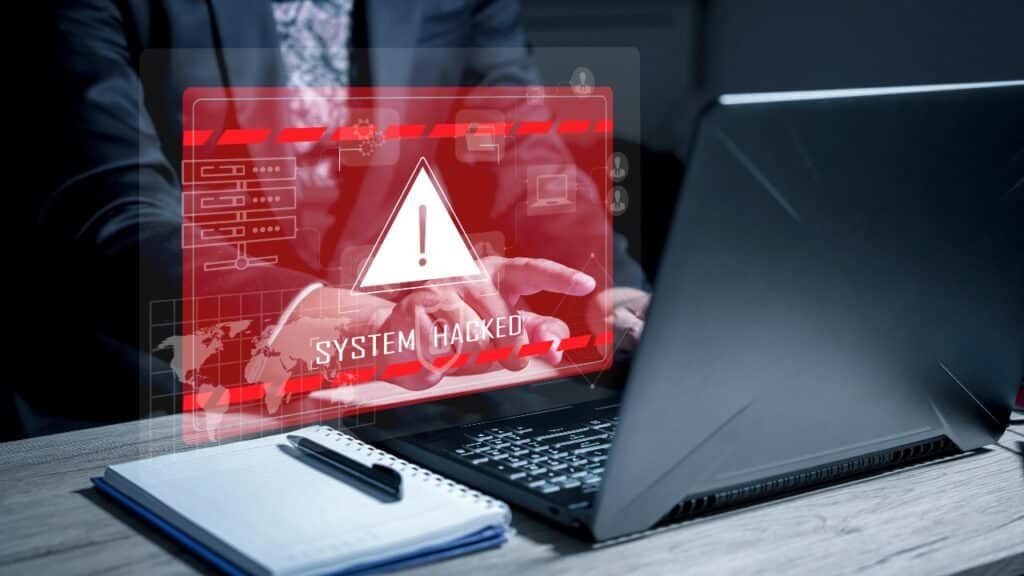System hacked alert after cyber attack on computer network.