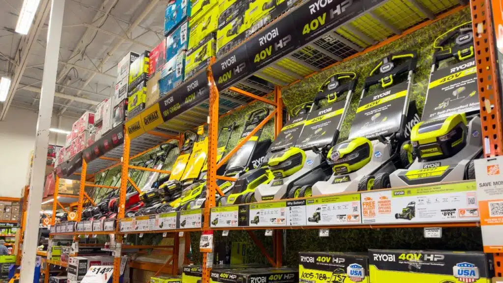 A view of several Ryobi lawn mowers, on display at a local retail store