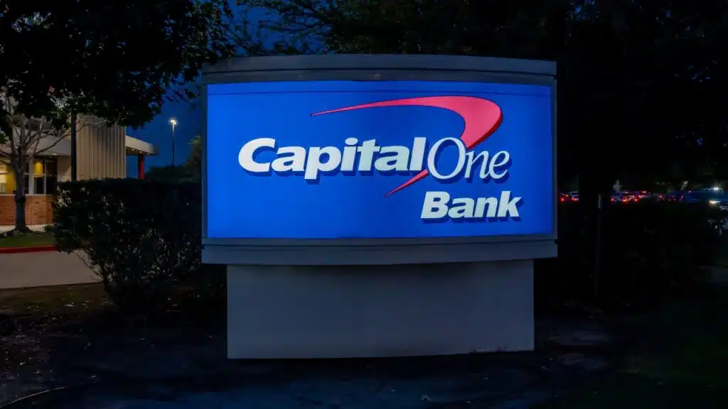 Close up of Capital One ground sign at night. Capital One Financial Corporation is an American bank holding company.