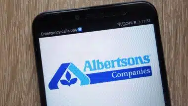 Albertsons Companies logo displayed on a modern smartphone