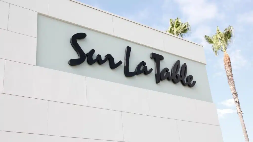 A view of a store front sign for the culinary and kitchen supply store known as Sur La Table.