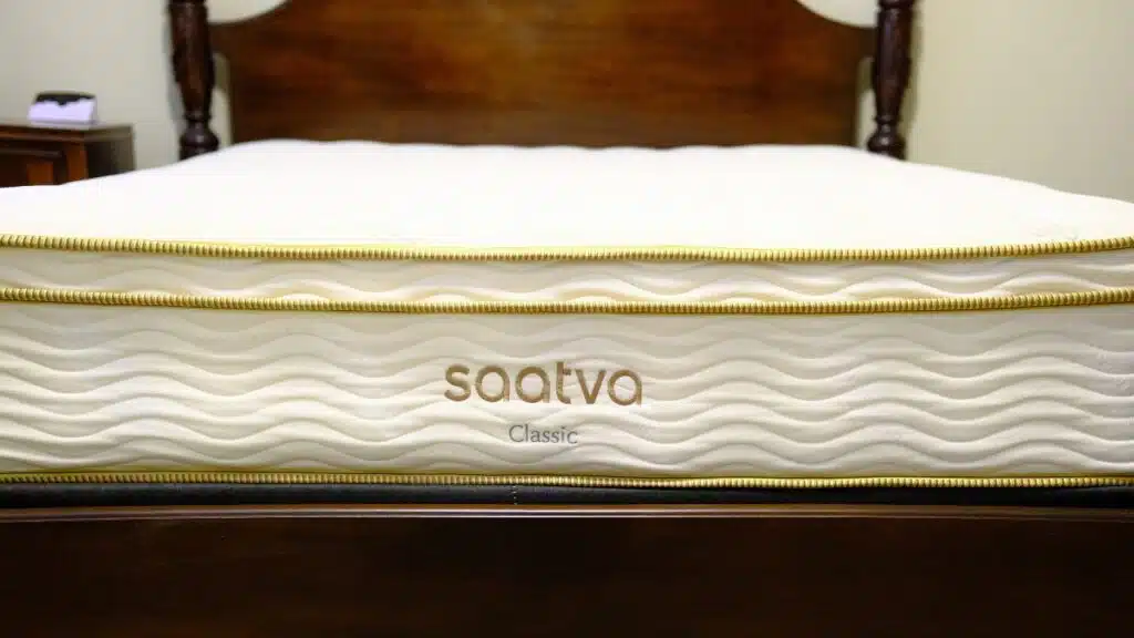 Saatva mattress on bed frame, Saatva is a privately held mattress company, based in New York. Since 2014, representing the Saatva class action