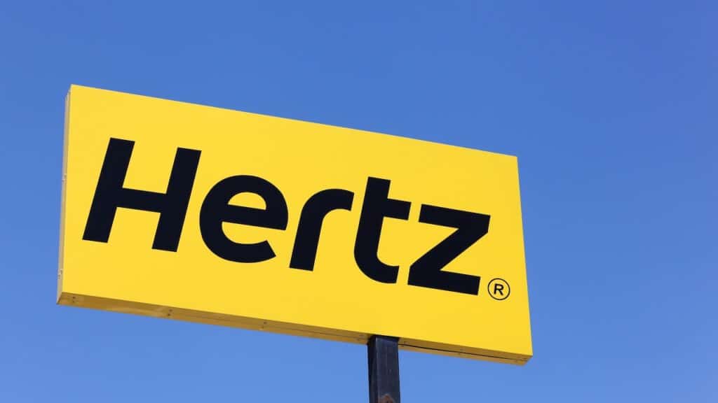 Hertz logo on a panel.