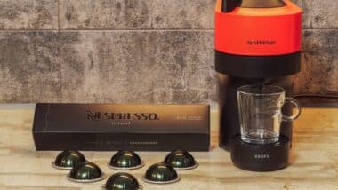 Automatic Nespresso Vertuo Pop machine used to create espresso with aluminum capsules.