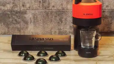 Automatic Nespresso Vertuo Pop machine used to create espresso with aluminum capsules.