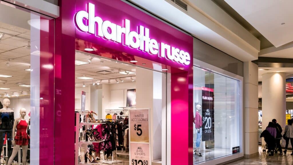 Charlotte Russe pink discount clothing store sign entrance shop.