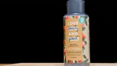 Illustrative Editorial: Love beauty and planet shampoo bottle, an ecological Unilever brand, on a dark and black background. Isolated.
