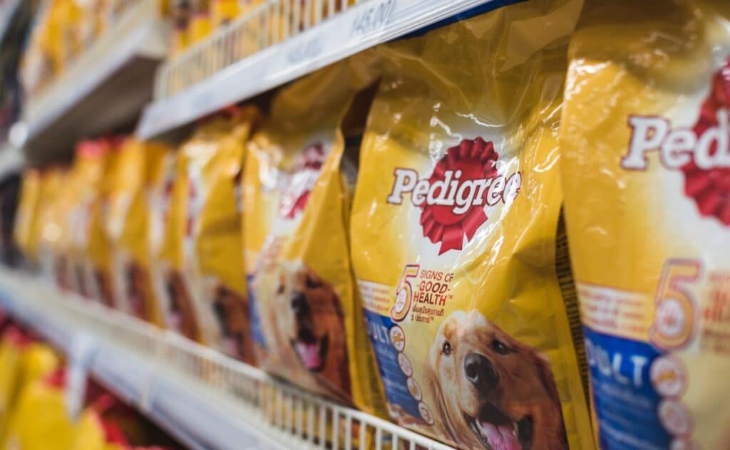 Pedigree Dog food found at the pet supplies aisle of a supermarket.