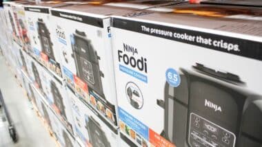 A view of several boxes of Ninja Foodi pressure cookers, on display at a local big box grocery store.
