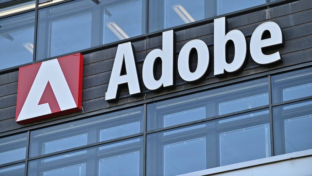 A wall sign for the American software company Adobe on an office building in Stockholm, Sweden.