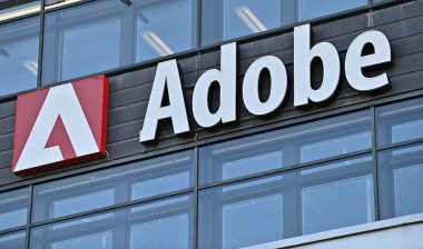 A wall sign for the American software company Adobe on an office building in Stockholm, Sweden.