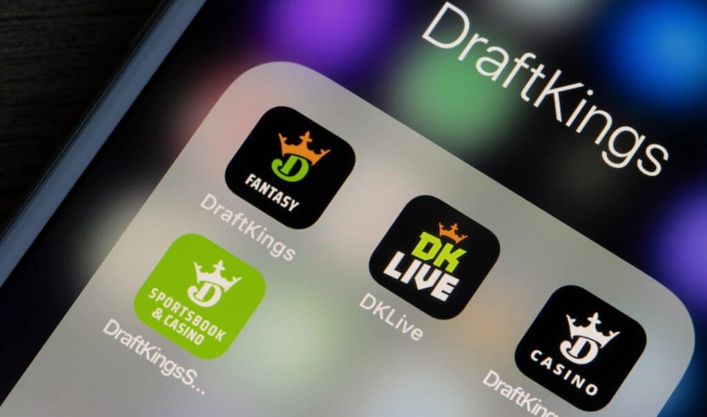 Assorted mobile apps owned by DraftKings, an American daily fantasy sports contest and sports betting operator, are seen on an iPhone.