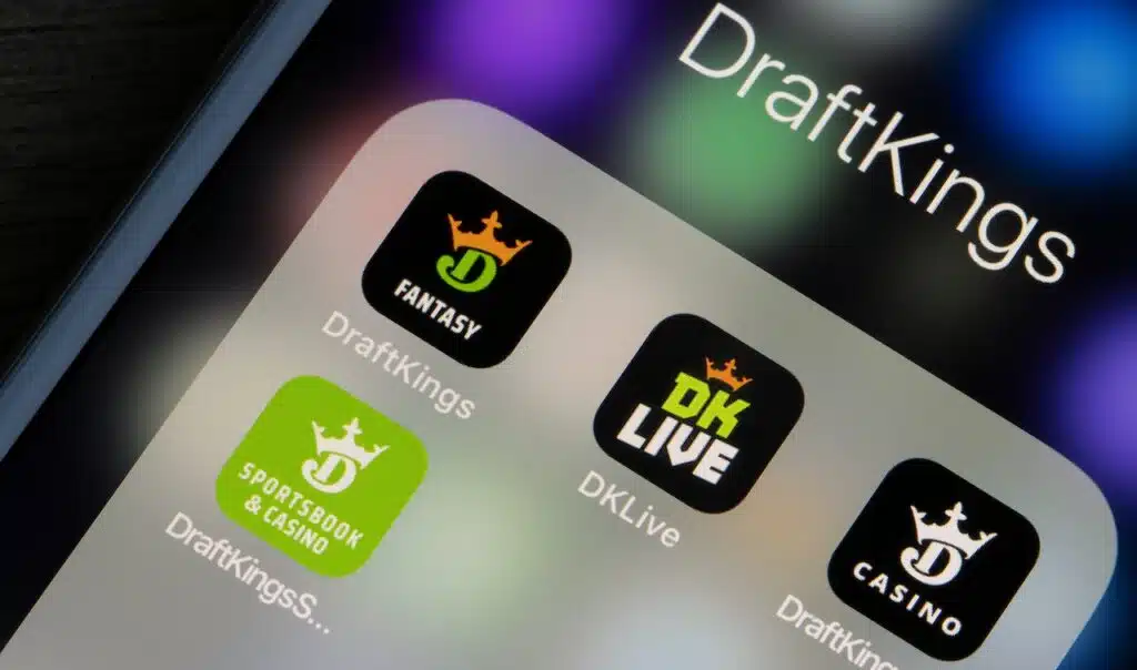 Assorted mobile apps owned by DraftKings, an American daily fantasy sports contest and sports betting operator, are seen on an iPhone.