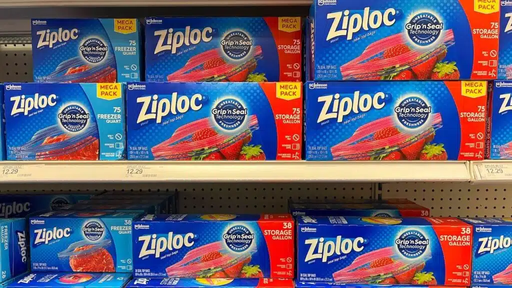 Grocery store shelf with boxes of Ziploc brand Gallon and Quart sized baggies.