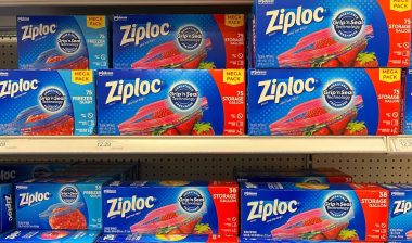 Grocery store shelf with boxes of Ziploc brand Gallon and Quart sized baggies.