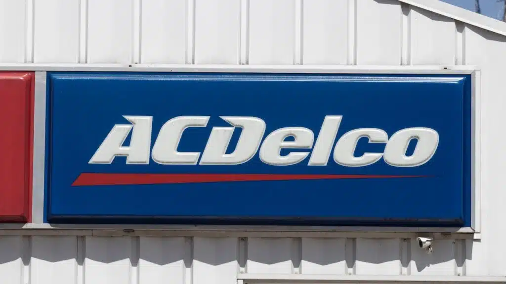 ACDelco sign at a car repair shop. ACDelco is a factory parts brand owned by General Motors (GM).
