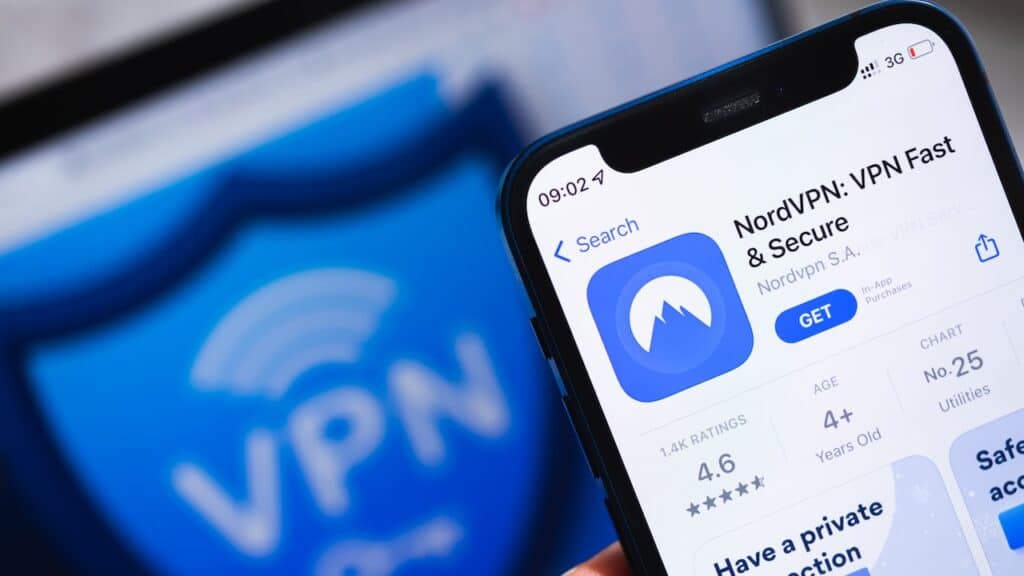 NordVPN app. Logo close-up. Smartphone in hand with VPN application photo