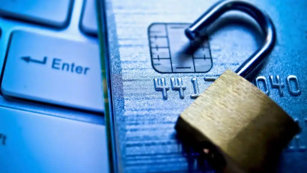 open security lock on credit cards with computer keyboard,