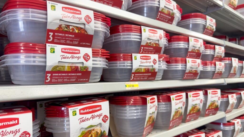 A view of several shelves dedicated to Rubbermaid Take Alongs containers, on display at the grocery store.